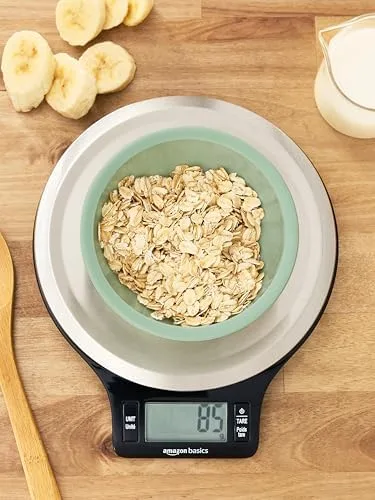 Amazon Basics kitchen scale close-up showing oats and digital readout