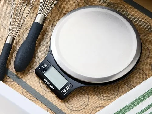 Amazon Basics digital kitchen scale showing stainless platform and LCD