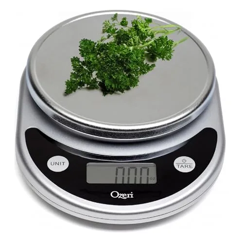 Ozeri Pronto digital kitchen scale weighing parsley on platform