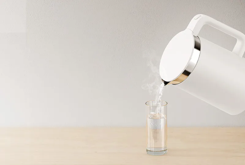 Mi Smart Kettle Pro pouring hot water into a glass