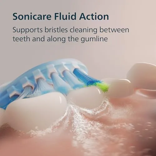 Philips Sonicare 6500 Series light pink electric toothbrush with sonic brush head attached