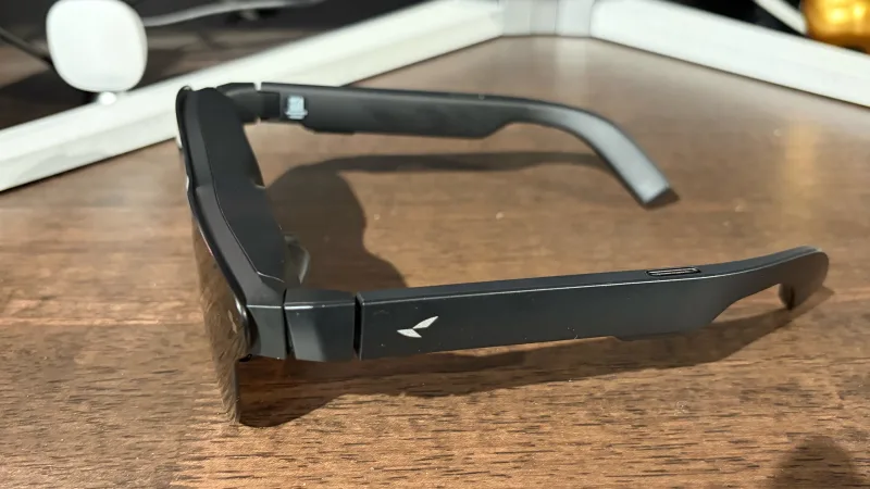 RayNeo 4 Pro smart glasses side view showing USB-C port area