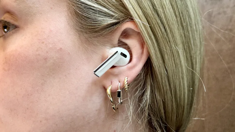 Samsung Galaxy Buds 3 Pro earbuds worn in ear close-up