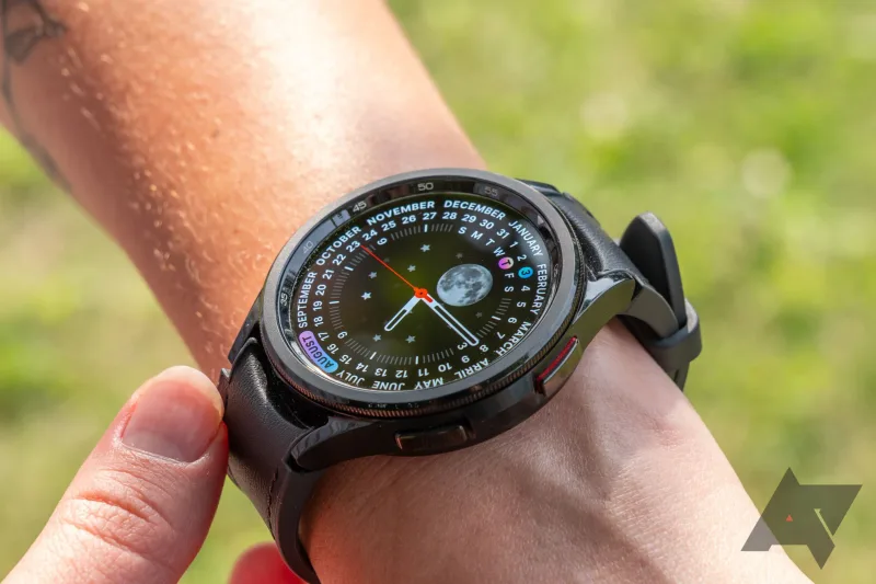 Samsung Galaxy Watch6 Classic watch face showing calendar and moon phase
