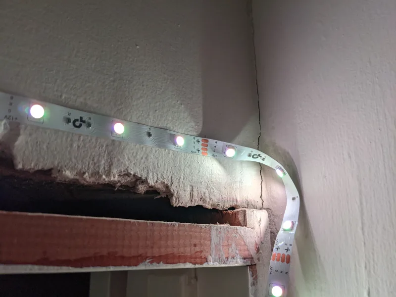 Kasa Smart KL400L10 LED strip lights installed under shelving