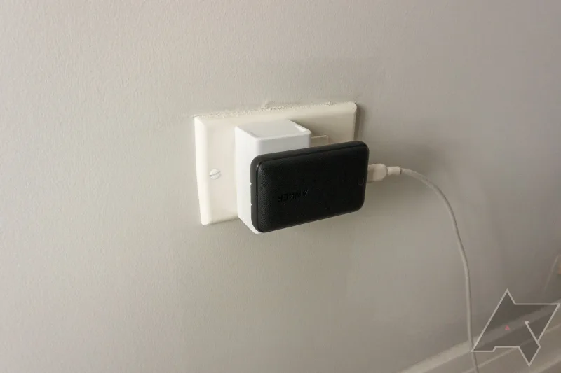 TP-Link EP10 smart plug used with Anker power bank at wall outlet