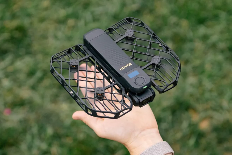 HOVERAir X1 PROMAX compact drone with protective casing outdoors