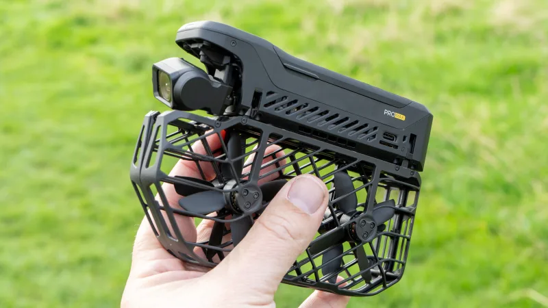 HOVERAir X1 PROMAX compact drone held in one hand