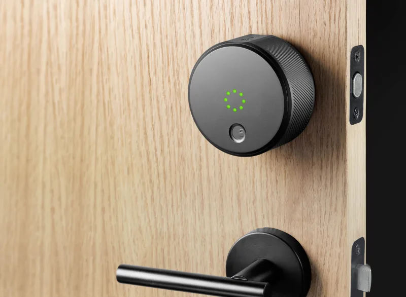 August Wi-Fi Smart Lock interior module mounted on wooden door