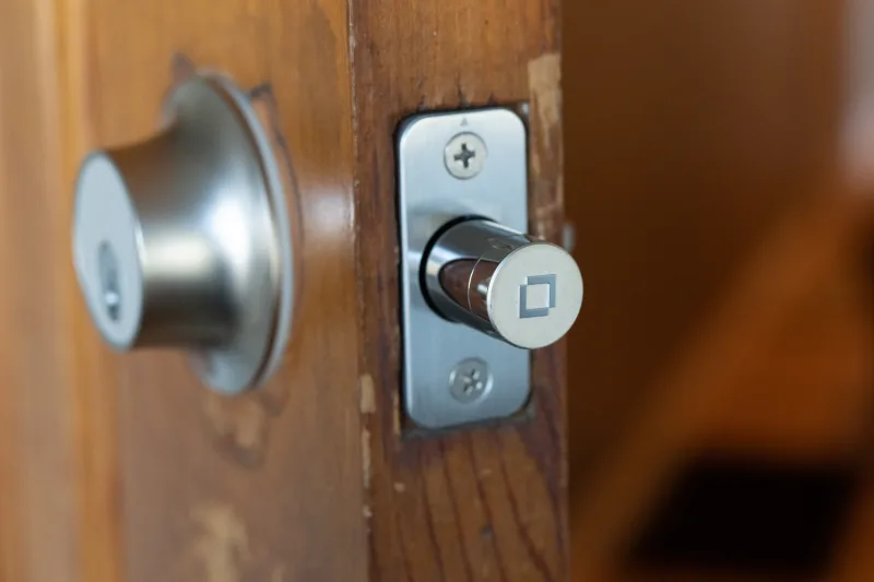 Level Lock+ deadbolt and knob close-up showing traditional lock hardware
