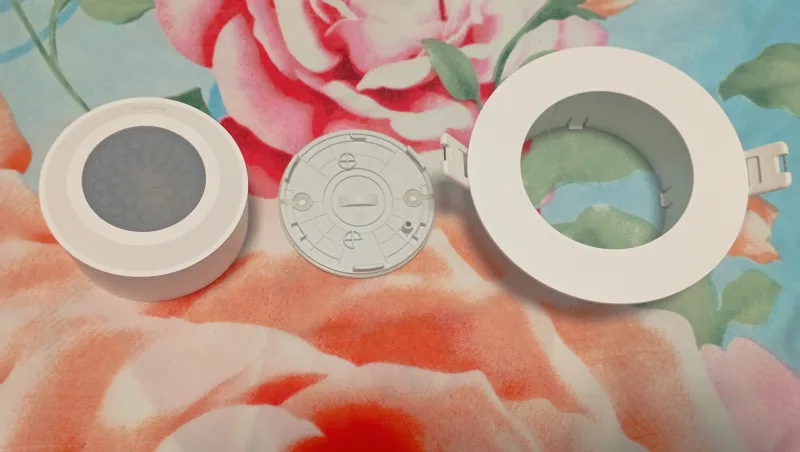 Aqara RTCGQ13LM motion sensor with 360-degree stand and mounting accessories