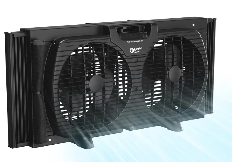 Comfort Zone 9-inch twin window fan in window showing dual-fan design