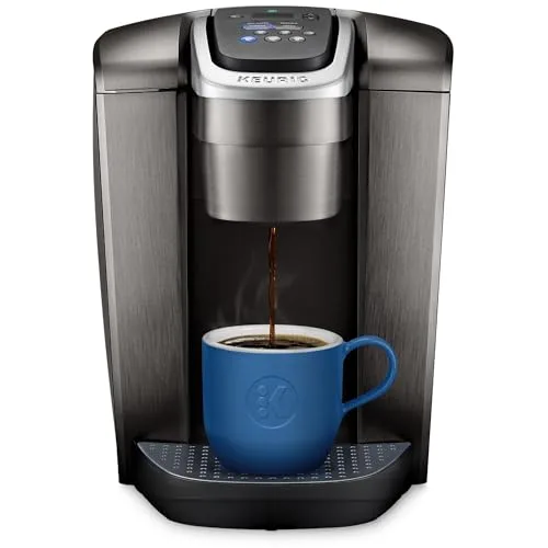Keurig K-Elite single-serve brewer dispensing coffee into a cup