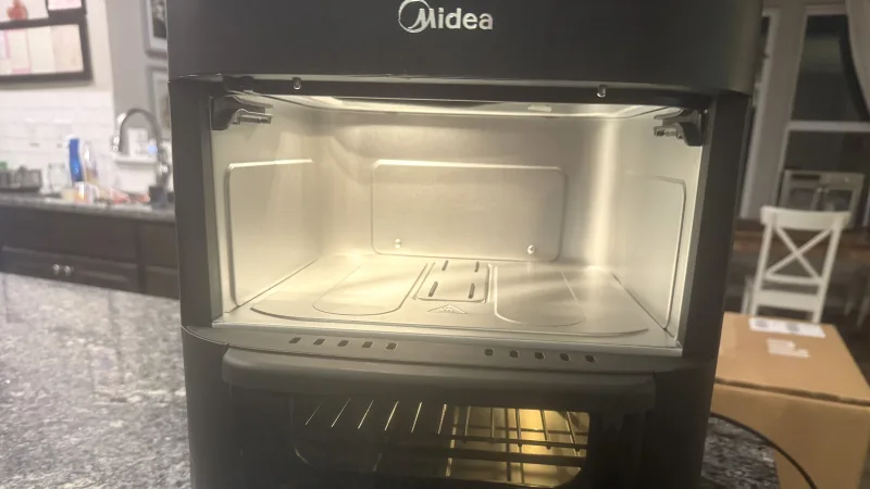 Midea Dual Basket Air Fryer Oven interior showing lower oven cavity rack