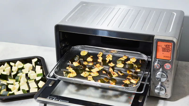 Breville Joule Smart Oven Air Fryer Pro cooking vegetables inside