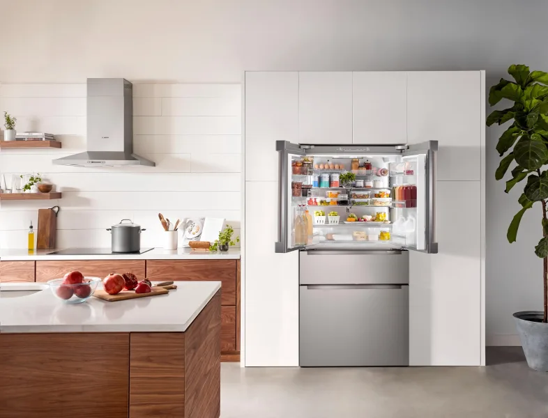 Bosch B36CL80ENS counter-depth stainless fridge with door open