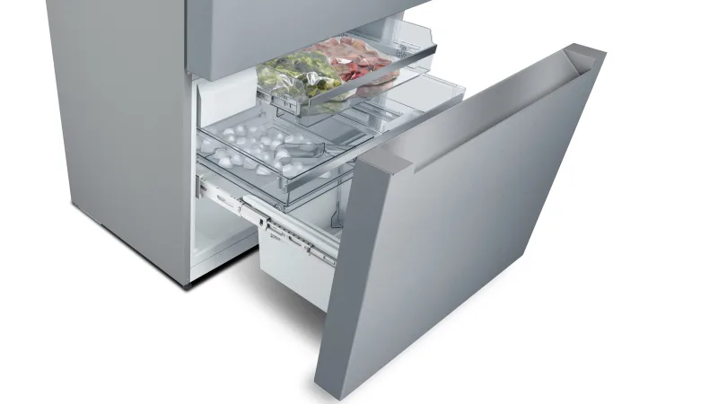 Bosch B36CL80ENS freezer drawers showing internal ice compartment