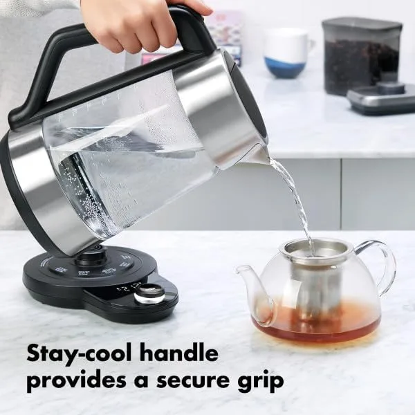OXO Brew Adjustable Temperature Kettle glass gooseneck pouring into teapot