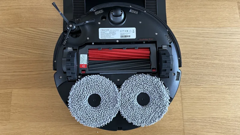Roborock Qrevo Master underside showing rollers and mop pads